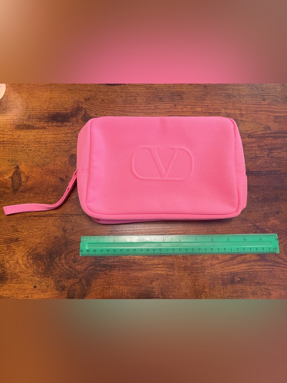 New Valentino Pink Embossed V Wristlet with Zipper. 10 x 6 x 2 i have 2 avail